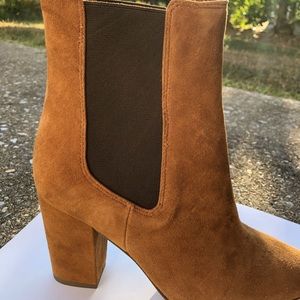 New, never worn, in the box. 7.5 medium.